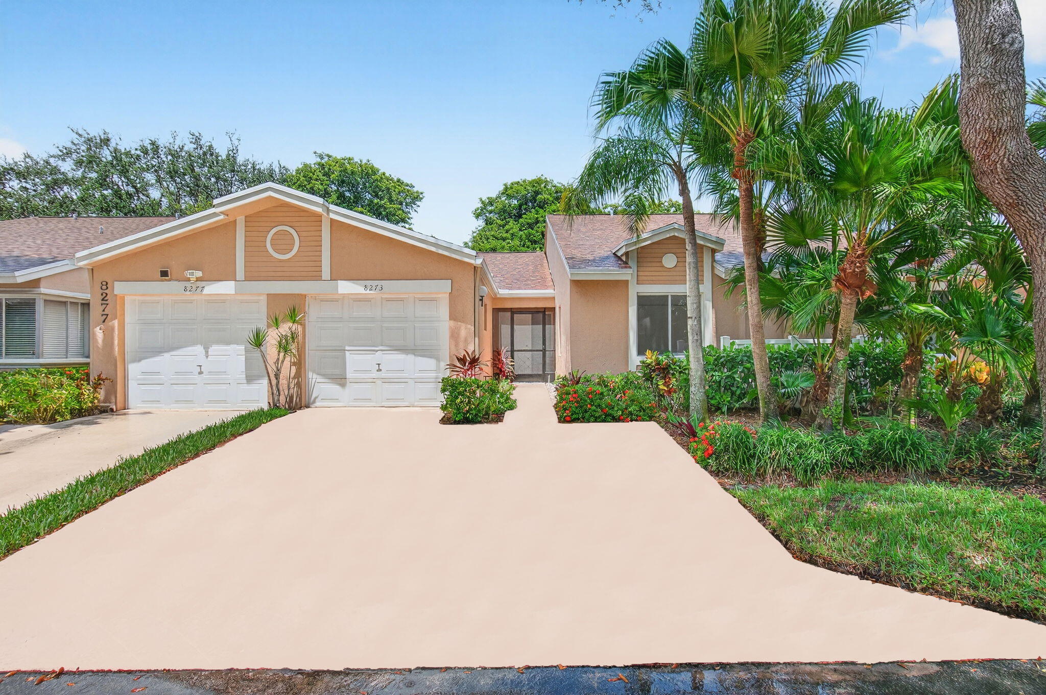 Move right in ....to this lovely, newly upgraded, one-story CHATEAU MODEL villa, featuring 2 bedrooms, guest bathroom and ensuite master bathroom--both with walk-in showers, eat-in kitchen, dining room, living room, washer/dryer area, front screen-enclosed entry area, and an air-conditioned screened-in den/Florida room that faces quiet, tranquil landscaped grounds. Notice the lush tropical landscaping in frontage along with colorful, perennial flowers that adorn the walkway to the unit's entrance.This villa boasts new stainless steel appliances in this fully renovated gourmet chefs eat-in kitchen, which includes new custom cabinets, quartz countertops, a cozy windowed breakfast area for a table or breakfast nook, lots of cabinets for storage, and new marbleized tile floors throughout.