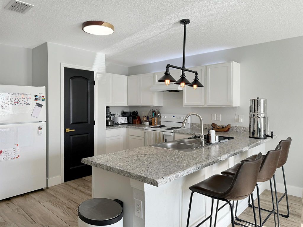 Photo of 1958 SE Floresta Drive, Port Saint Lucie, FL 34983 (MLS # R10992469)