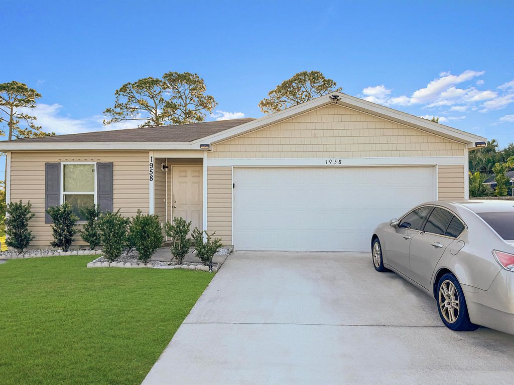 Photo of 1958 SE Floresta Drive, Port Saint Lucie, FL 34983 (MLS # R10992469)