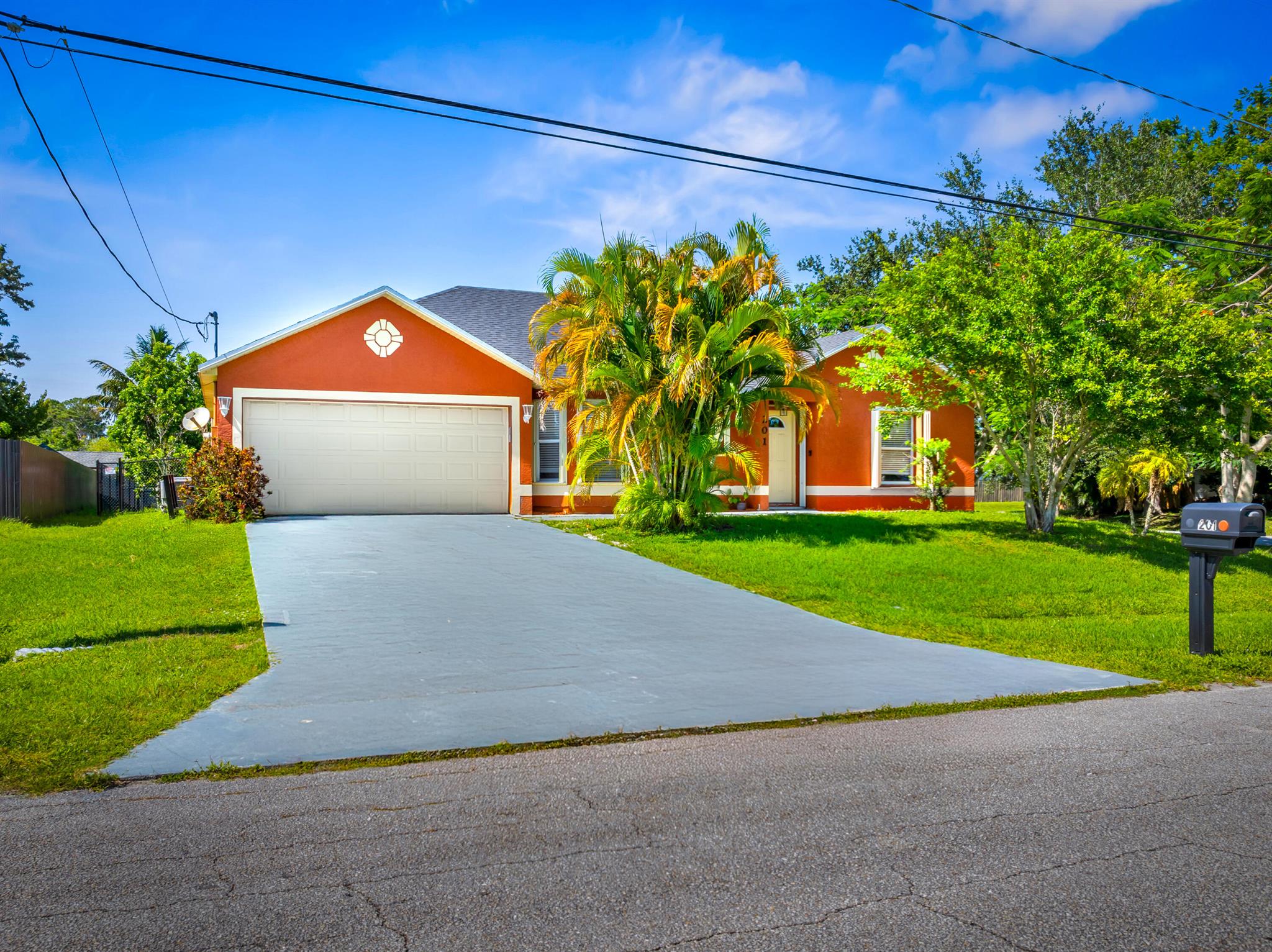 Step into comfort and convenience with this spacious 4-bedroom, 2-bathroom CBS home featuring a 2-car garage, set on a prime corner lot which backs up to a canal for added privacy. Built in 2002, this well-cared-for home offers a brand-new roof (2023), new privacy fence, and a large storage shed--perfect for tools, hobbies, or extra space. Inside, the open split floor plan is designed for everyday living, offering both privacy and flow. The kitchen is equipped with stainless steel appliances and plenty of counter space, ideal for cooking, entertaining, or family gatherings. Natural light fills the home, creating a bright, welcoming atmosphere. Enjoy easy, low-maintenance living in a quiet neighborhood that's just minutes from shopping, dining, schools, and major highways.
