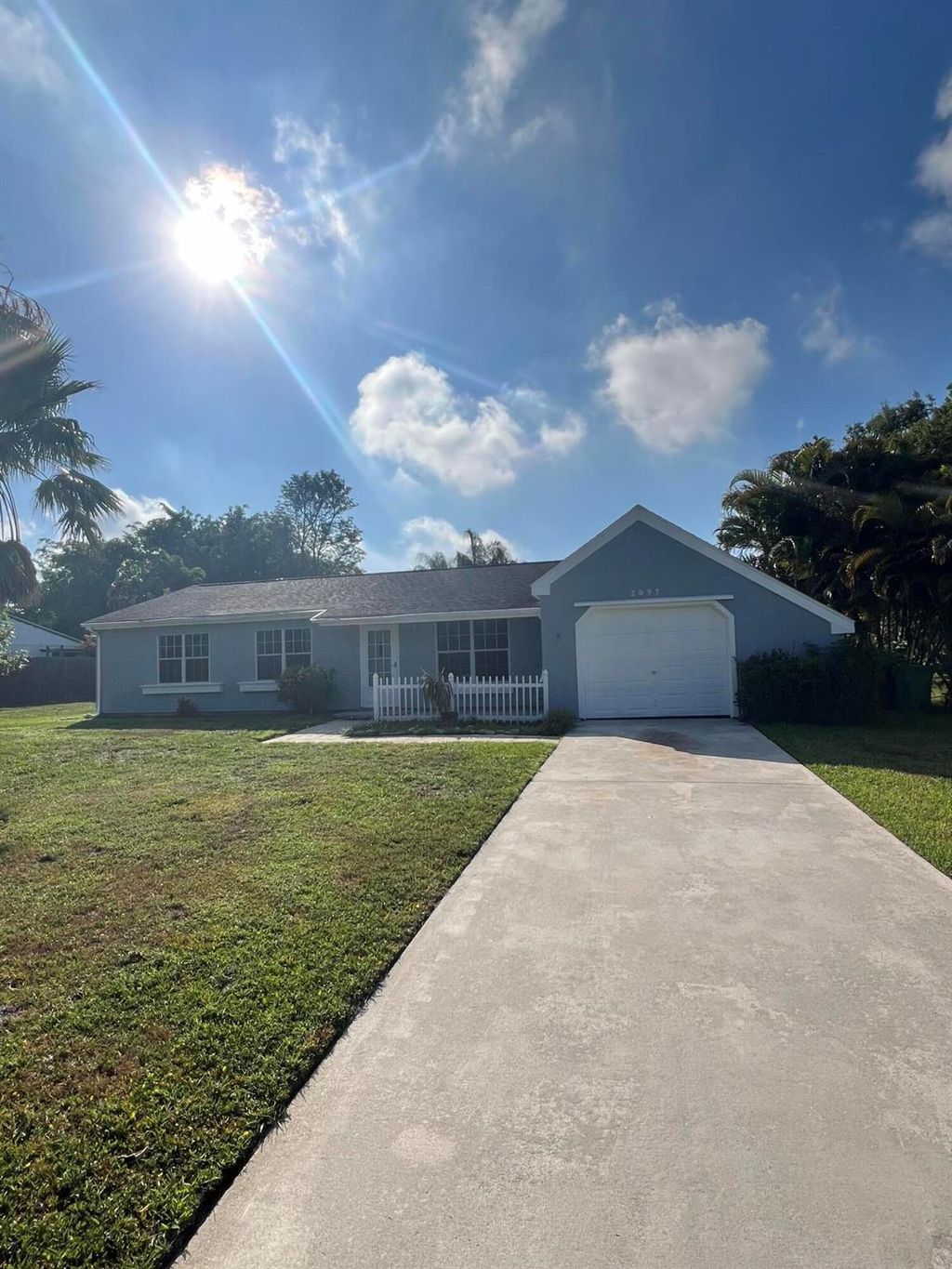 Photo of 2097 SE New York Street, Port Saint Lucie, FL 34952 (MLS # R10994569)