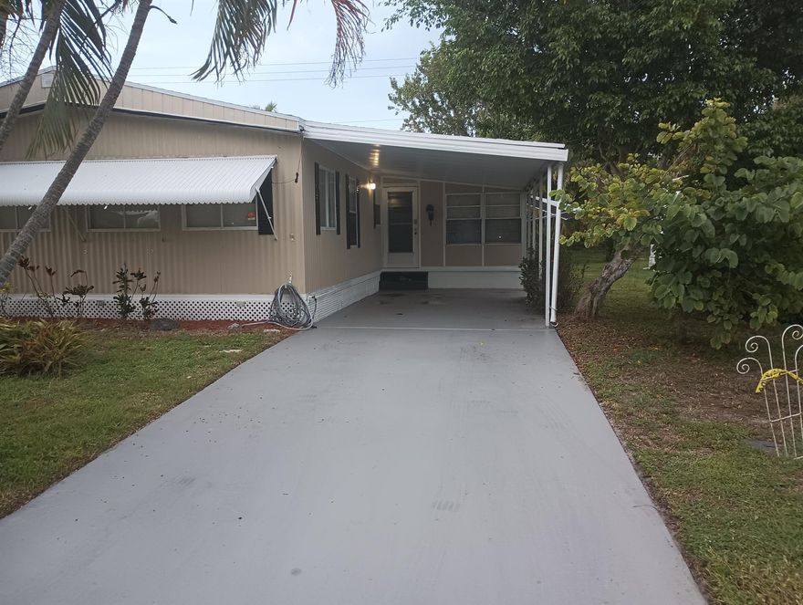 Welcome to Spanish Lakes Riverfront, a vibrant 55+ community where comfort meets convenience. This 2-bedroom, 2-bathroom manufactured home offers approximately 1,200 sq. ft. of living space with a thoughtfully designed floor plan.- 🏡 Spacious Living - The large living room includes an extended front area, perfect for a home office, reading nook, or guest space.- 🌞 Florida Room - Sliding doors off the kitchen open to a bright Florida room, ideal for morning coffee or entertaining.- ❄️ Upgrades - Recently updated with a new HVAC system, new refrigerator, new microwave, and a freshly painted exterior.Lot rent approx $840 per month