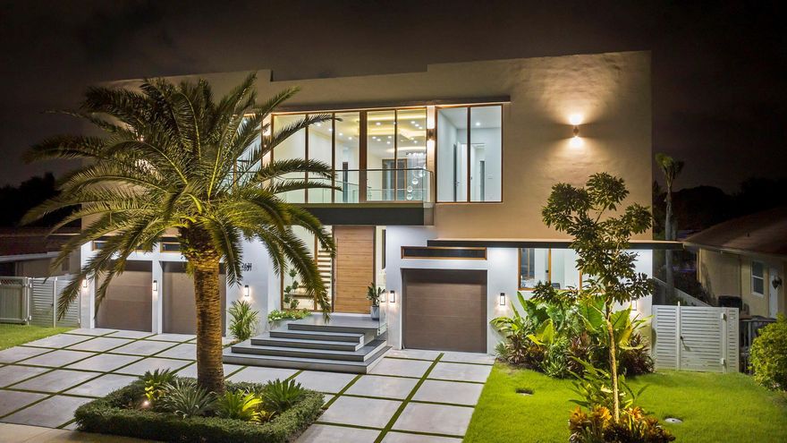 Contemporary Lighthouse Point Masterpiece w/Private Dock & Infinity Pool/SpaWelcome to a realm of unparalleled luxury at 2631 NE 48th Court, a stunning 5-bedroom, 5.5-bathroom new construction home with a private dock and the finest craftsmanship throughout.Sleek lines and bespoke European finishes permeate every inch of this captivating two-story, 5,100-square-foot  under air residence. Ornate ceiling details add a touch of grandeur, while custom wood and stone wall coverings infuse warmth and style into the living spaces.A 10-foot single-panel pivot front door provides a grand entrance and enhances security.