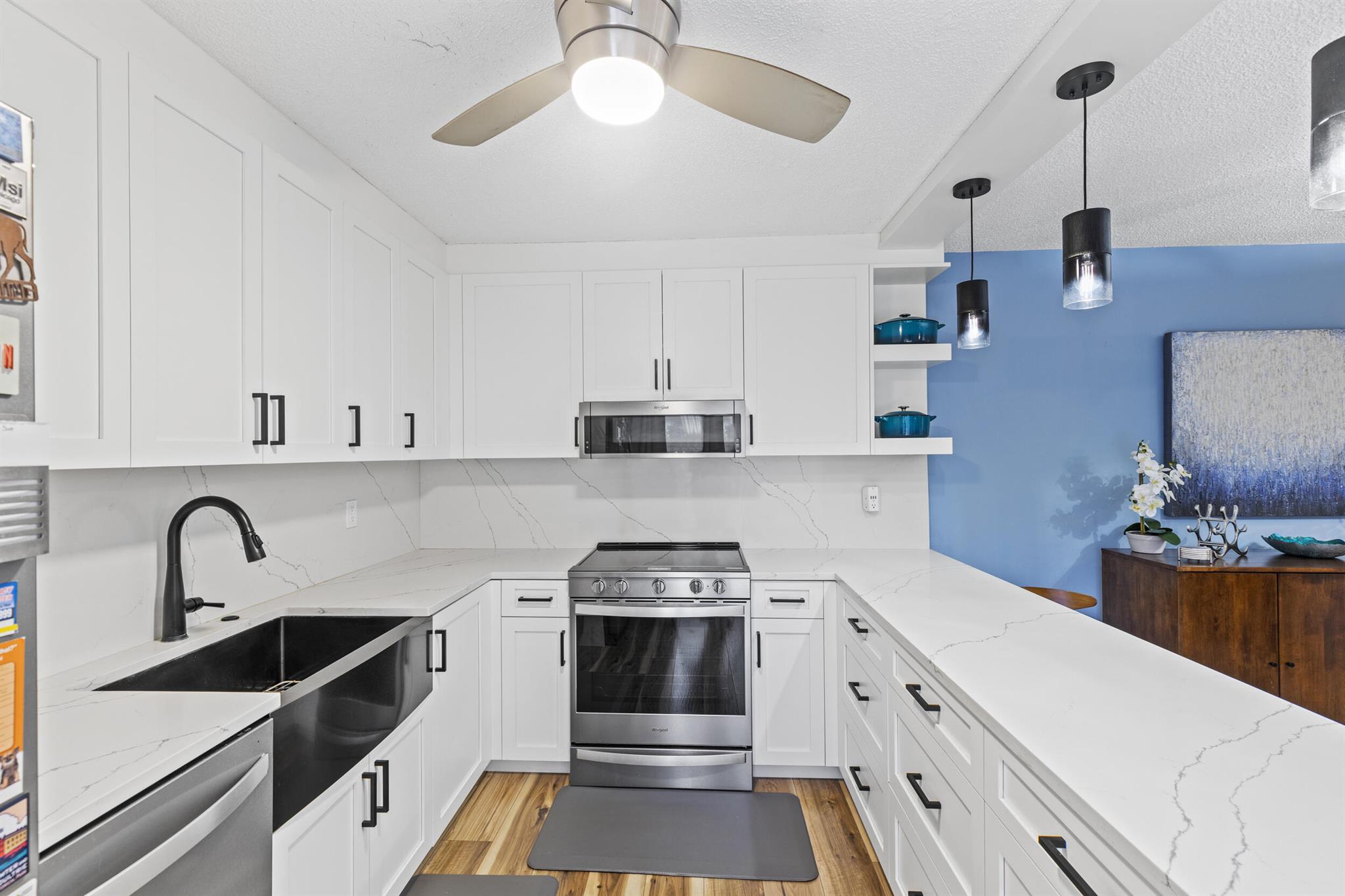 Welcome home to your move-in ready oasis in Boynton Beach! Stunning 3 bedrooms, 2.5 bathrooms townhome features solid CBS construction with a brand-new roof (2024). Gorgeous remodeled kitchen with beautiful Quartz countertops. Downstairs bedroom has a built-in desk and Murphy bed, perfect for working from home and/or a guest room! Experience spacious living with generously sized bedrooms, including a truly expansive primary suite. Step outside to your private tropical courtyard, perfect for relaxing or entertaining under the Florida sun. Situated in the tranquil Oakwood Lakes community, which welcomes all ages and pets. Enjoy community amenities like a pool, tennis courts, and a clubhouse. Centrally located to shopping, dining and only 4 miles to the beach. Easy highway access.