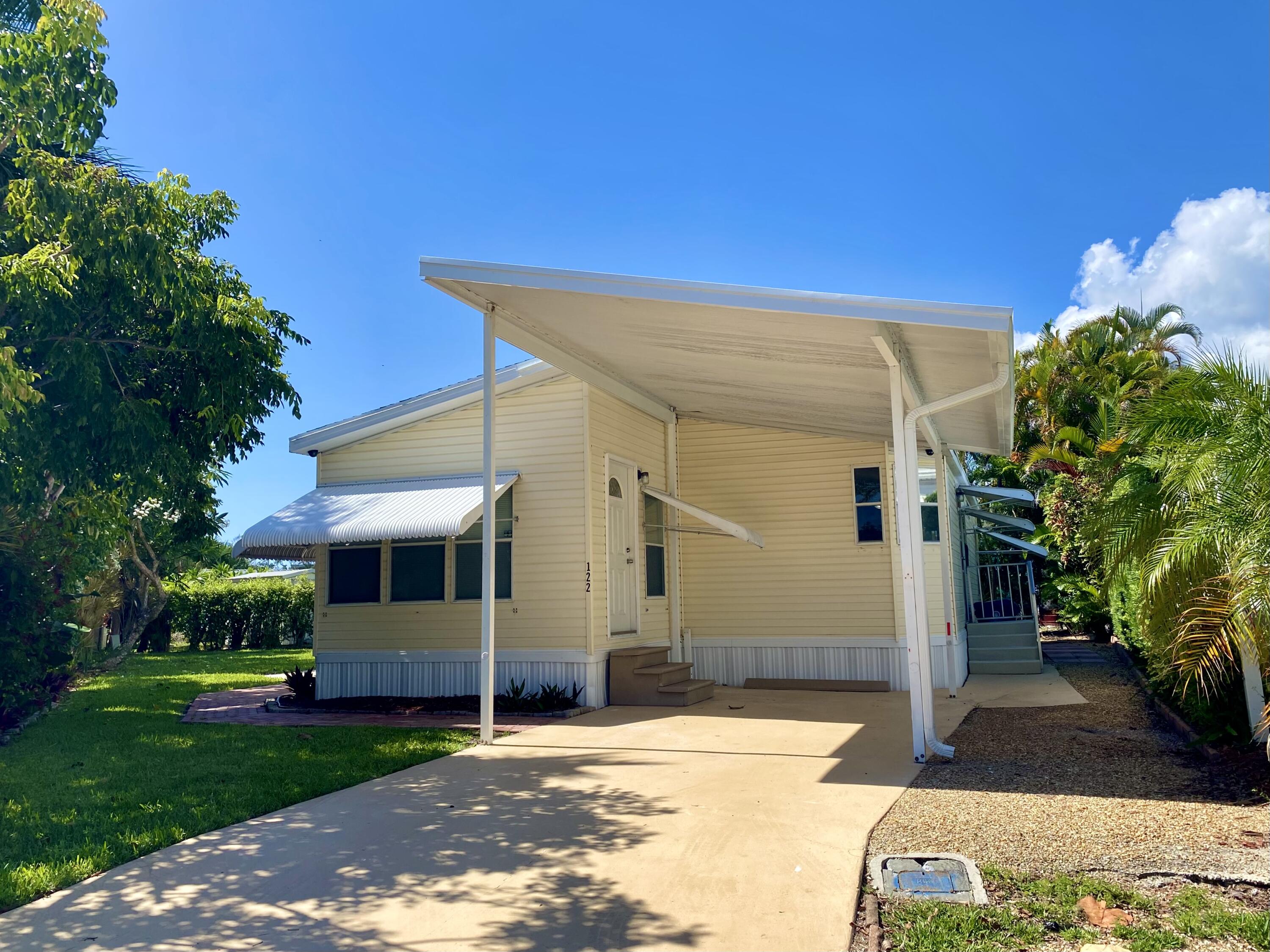 Where else can you live in Jupiter ON the Water, steps away from beach, and a Dock for your own boat? One of the largest parcels in Jupiter River Park, this 2 bedroom 2 bathroom Plus Den with a large open kitchen is ready for you to make your own. Vaulted ceilings, New ON-demand tankless water heater, stainless steel appliances, natural light. Plenty of space for gardening or any other outdoor hobbies you have. Covered carport parking plus a large driveway for additional parking for your guests, large side yard and shed. Enjoy leisure living but close to shopping, restaurants, and more. Community dock available to all residents with a wait list to use specific boat docs for you boat. Dock is always available for fishing, kayaking and more.