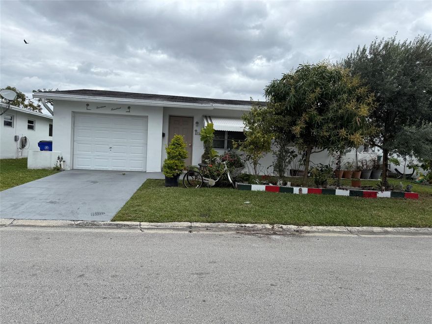 Welcome to this beautiful and Spacious 2 bed/1 bath single family home, located in a charming 55+ community of Paradise Gardens in Margate, Florida! With natural open spaces surrounded by canals, this peaceful community enjoys a true Florida lifestyle, pet-friendly, clubhouse, heated pool, pool tables, a game room, water float-pool-water-swim aerobics, bingo and more. LOW maintenance fee. No Rentals First Year of Ownership. HOA covers lawn care and houses are painted every 5 years.