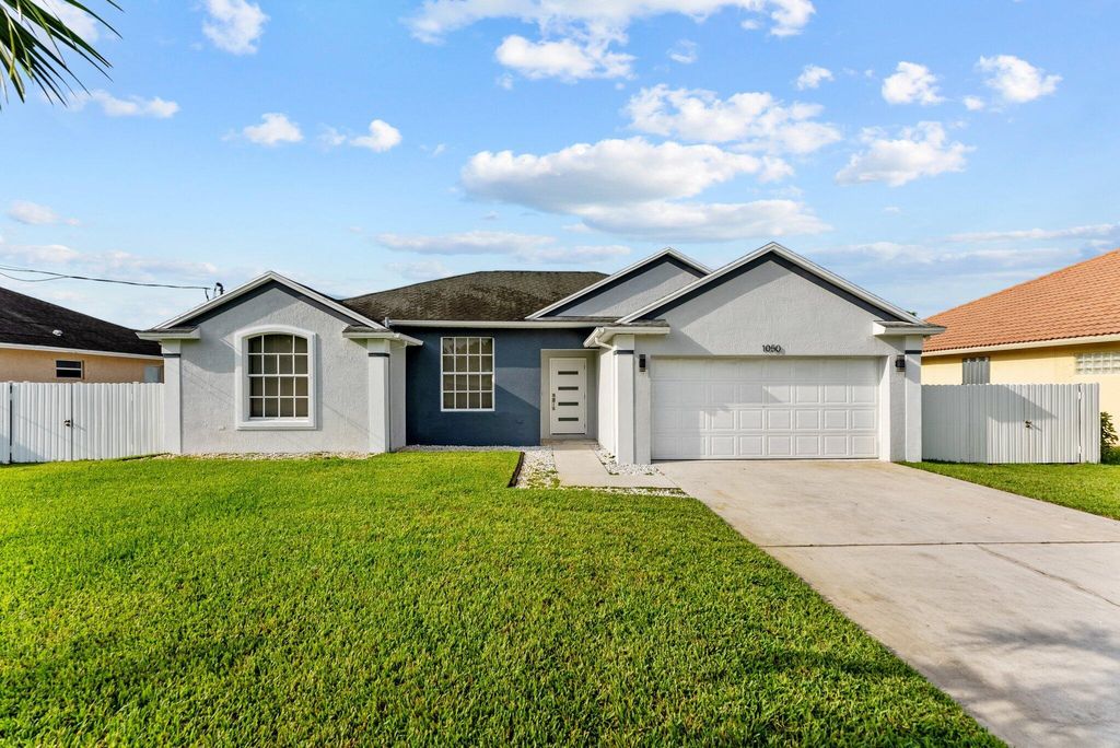 Photo of 1050 SW Jericho Avenue, Port St Lucie, FL 34953 (MLS # R10899201)