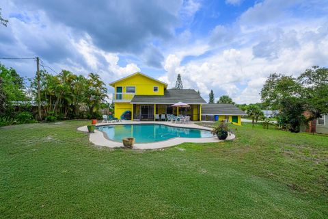 Photo of 9291 SE Duncan Street, Hobe Sound, FL 33455 (MLS # R11105461)