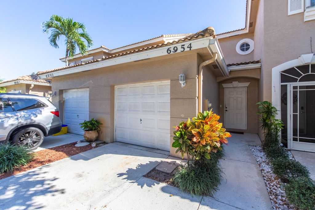 Photo of 6954 Oak Bridge Lane, Lake Worth, FL 33467 (MLS # R11041092)