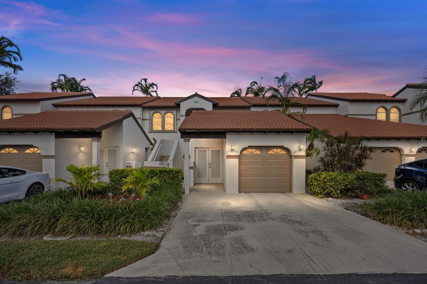 Wake up to sunrises over Palm Beach National's championship fairways at St Andrews Glen--2nd floor golf course view without mandatory membership. Start every morning watching light spill across Joe Lee's legendary 1962 design, rated number four best place to play golf in America by GolfAdvisor. This corner unit delivers the lifestyle without the dues or the maintenance--golf cart-friendly community, attached garage, turn-key ready.Panoramic golf course views from screened lanai with impact windows. Open eat-in kitchen with pantry--white-on-white, bright and clean. Vaulted ceilings create light and volume. Primary bath: walk-in shower plus separate soaking tub. Well-maintained original condition--move in or customize. Golf cart community with garage storage. Palm Beach County's A-rated scho