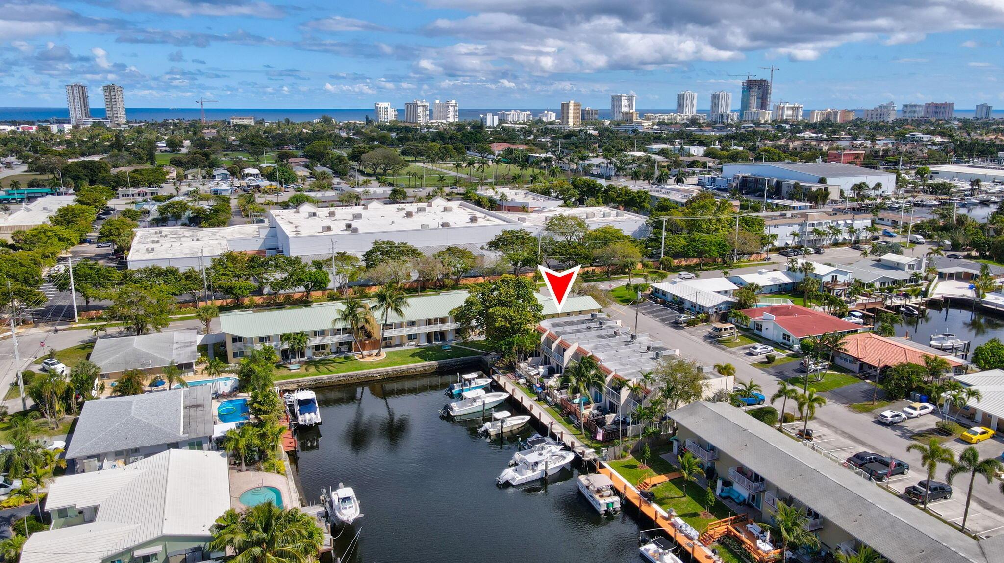 Inviting WATERFRONT Studio Oasis! Step into this move-in ready gem on the first floor, offering serene views of one of two pools. Enjoy the convenience of on-site laundry and your assigned parking space that can fit two cars. Cypress Cove, a sought-after community in East Pompano Beach, is a meticulously maintained boutique building offering tranquil living for all residents - water included in rent. This studio, spanning over 550 sq ft, showcases a walk-in closet, allowing for organized and spacious living and a full bathroom. Embrace the ease of quiet living, pet-friendly, and close proximity to the beach, highways, parks, shopping, and restaurants. Impact windows and central A/C ensure comfort all year round.