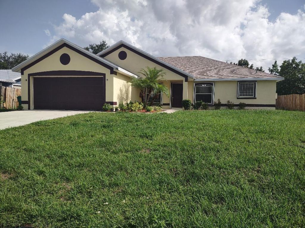 Photo of 1032 SW Castaneda Lane SW, Port Saint Lucie, FL 34953 (MLS # R11099962)