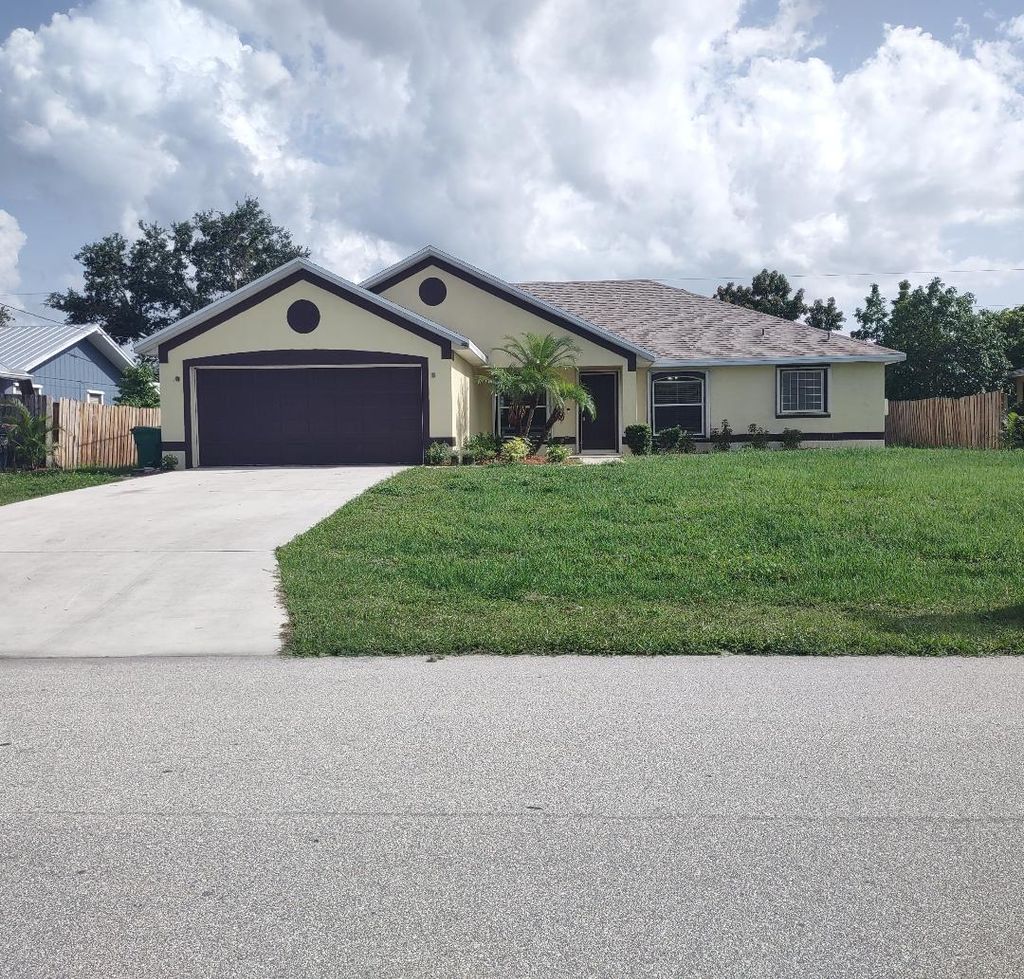 Photo of 1032 SW Castaneda Lane SW, Port Saint Lucie, FL 34953 (MLS # R11099962)