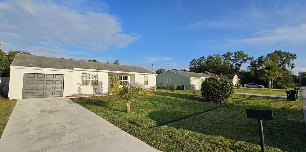 Photo of 2537 SE Lakewood Street, Port Saint Lucie, FL 34952 (MLS # R10966644)