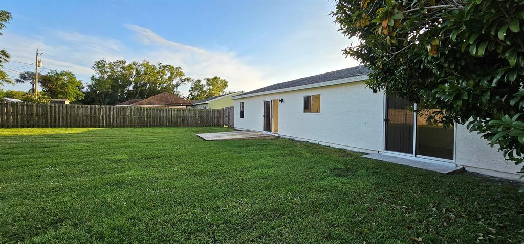 Photo of 2537 SE Lakewood Street, Port Saint Lucie, FL 34952 (MLS # R10966644)