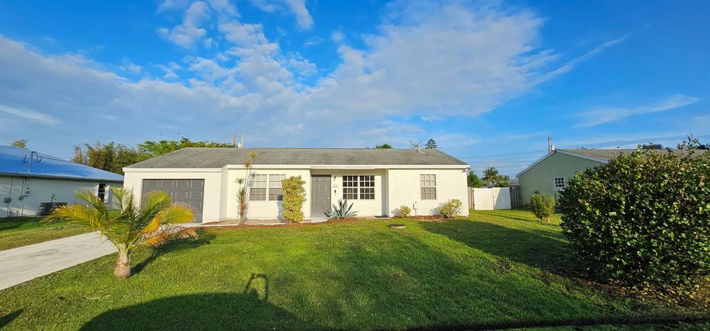 Photo of 2537 SE Lakewood Street, Port Saint Lucie, FL 34952 (MLS # R10966644)