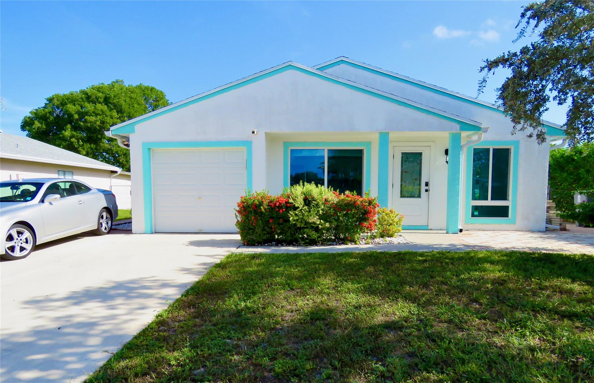 BRIGHT OPEN-CONCEPT SINGLE FAMILY HOME with VAULTED CEILINGS, 3 BEDS, 2 BATH with GARAGE in BOCA RATON, zoned with A-RATED SCHOOLS. **** Gorgeous QUARTZ COUNTERTOPS & BACKSPLASH, with WATERFALL EDGE and Open Dining, Living, and Kitchen!*** STAINLESS STEEL APPLIANCES, TILE FLOORING in main living, with WOOD flooring in Bedrooms.
Enjoy NEWER HURRICANE IMPACT WINDOWS & DOORS, NEWER ROOF & TANKLESS WATER HEATER*** FENCED BACKYARD, HURRICANE IMPACT DOUBLE DOORS TO SIDE AND BACK PATIO with WATER VIEWS and direct access to Walking Path by Lake. Sprinklers on LAKE WATER - Lower WATER UTILITY BILL.
Country Park Community offers Large POOL, TENNIS, RACQUETBALL, BASKETBALL, and JACUZZI.