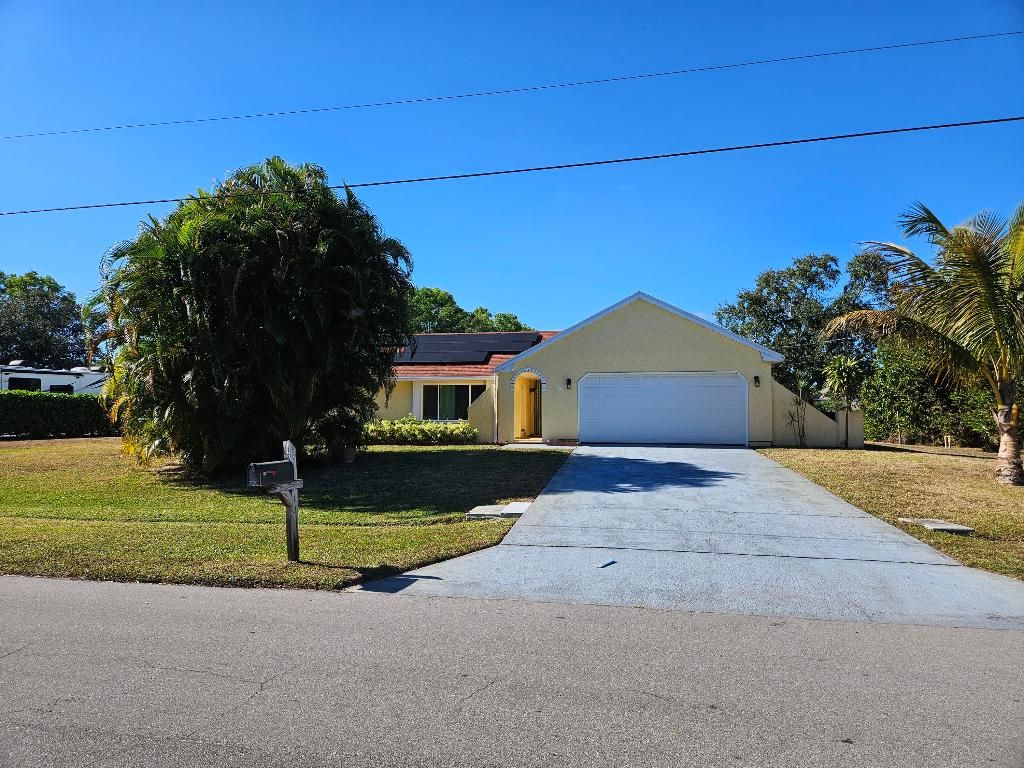 Photo of 3002 SE Dalhart Road, Port Saint Lucie, FL 34952 (MLS # R11157655)