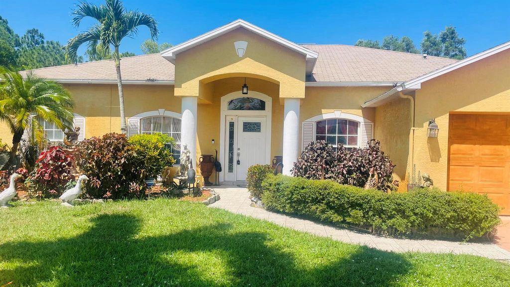 Photo of 5475 NW North Crisona Circle, Port St Lucie, FL 34986 (MLS # R11005947)