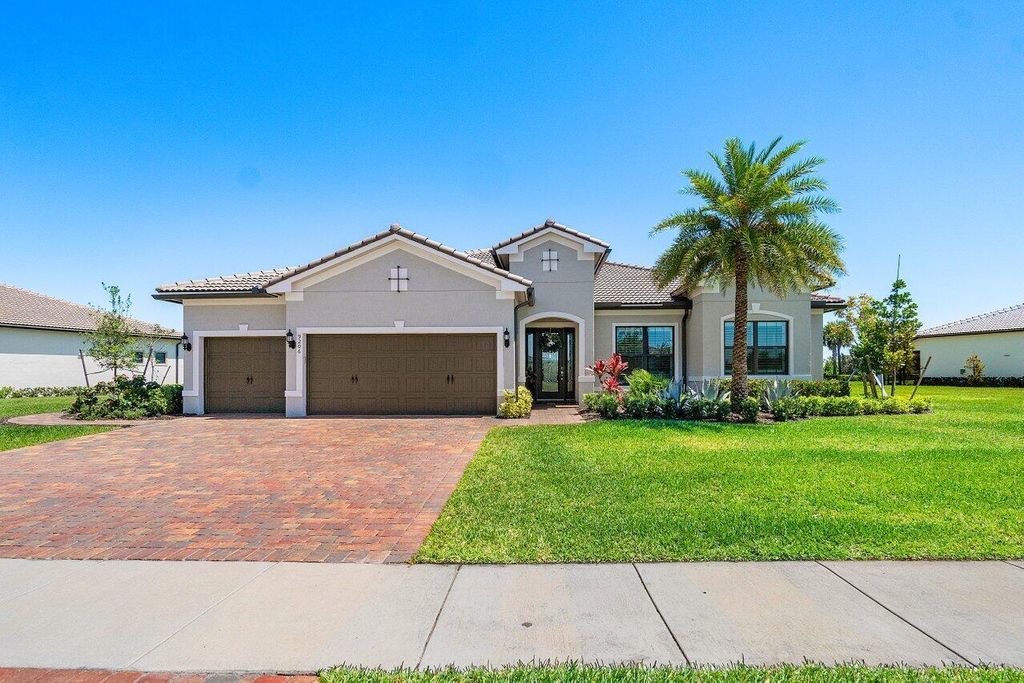 Photo of 9206 Balsamo Drive, Palm Beach Gardens, FL 33412 (MLS # R10976877)