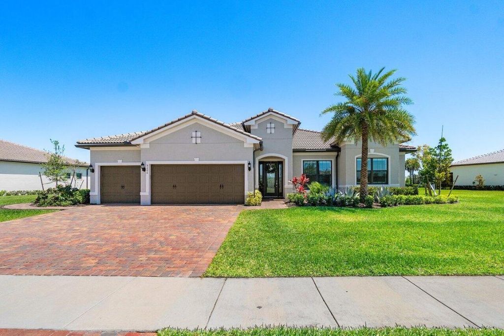 Photo of 9206 Balsamo Drive, Palm Beach Gardens, FL 33412 (MLS # R10976877)