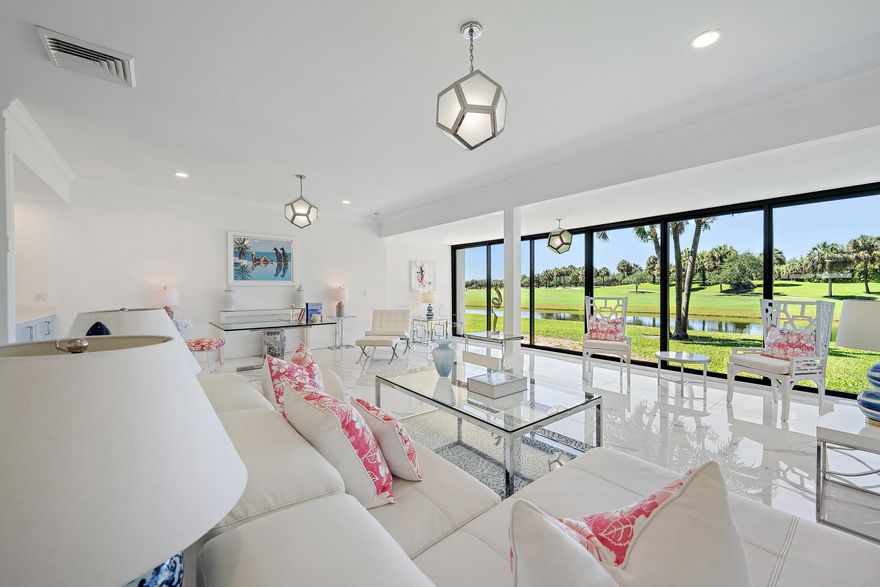 Step into refined elegance and effortless comfort in this beautifully renovated 2,719 SF townhouse, nestled within an exclusive gated community. From the moment you enter, you're welcomed by light-filled, open-concept living spaces, enhanced with fantastic views on the Jack Nicklaus signature golf course , premium finishes, and meticulous attention to detail. The spacious layout offers the perfect balance of style and comfort, ideal for both relaxed living and elegant entertaining. The gourmet eat in kitchen is a true centerpiece, featuring sleek cabinetry, high-end appliances, and ample space for gathering & cooking. The living and dining areas flow effortlessly, creating an inviting atmosphere that extends to private outdoor spaces—perfect for enjoying peaceful mornings or sunset evening Seller offers a $ 25,000 initiation fee, granting exclusive Social membership access to Dutchman's Pipe Golf and Country Club and the Belgrove Marriott Autograph Collection Hotel literally as good as next door.  Located within a secure, beautifully maintained gated community, residents enjoy privacy, tranquility, —all just moments from shopping at the Tanger Outlet Mall, dining, and major conveniences of what downtown WPB and Palm Beach Island offers.  This is more than a home—it's a lifestyle defined by comfort, elegance, and modern living at its finest.