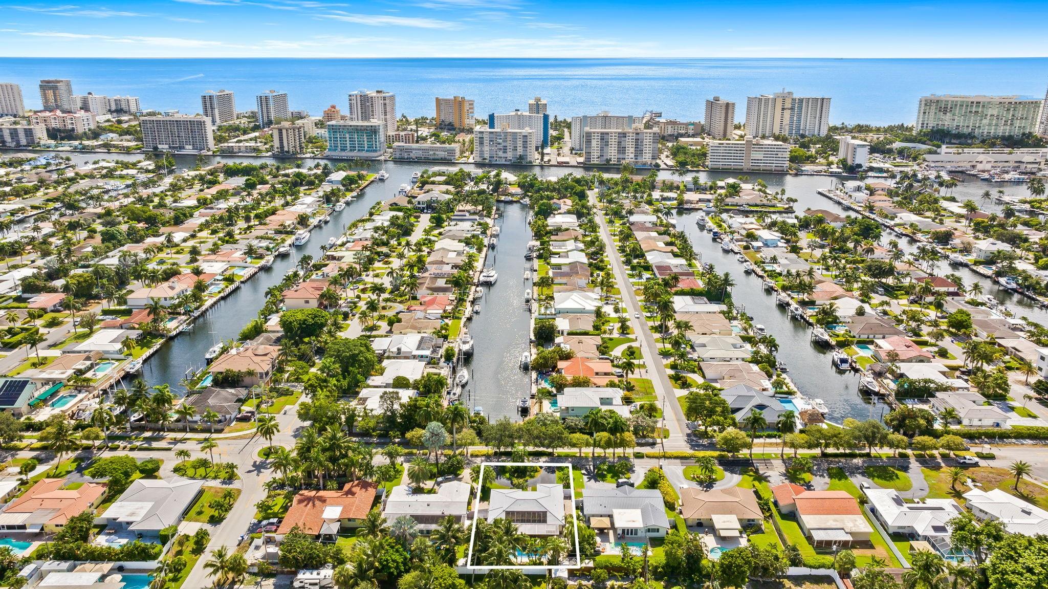 In the heart of Pompano Beach, one of South Florida’s fastest-growing hotspots—just steps from the pier, dining & shops! This immaculate, fully furnished home offers a split floor plan w/ 2 spacious beds, 2 baths & an open indoor/outdoor layout perfect for entertaining. Enjoy lush landscaping, a sparkling saltwater pool w/ solar heating & a large open kitchen plus wet bar, sleek Bosch cooktop, KitchenAid appliances & snack counter. Walk-in closets, impact windows & doors, tile floors and natural gas for the water heater & dryer help keep bills low. Outdoor luxuries include a built-in Alfresco grill, shower, reclaimed water irrigation for cost savings & wraparound driveway. Comfortable living & family rooms complete this turnkey oasis—landscaping & pool service included, no pets or smoking.