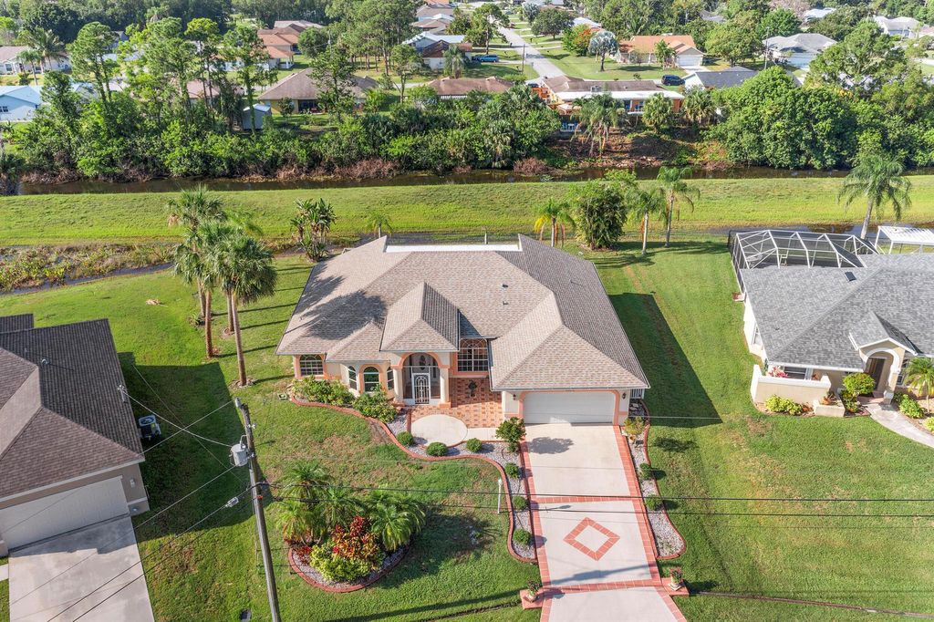 Photo of 4872 NW Ever Road, Port Saint Lucie, FL 34983 (MLS # R10989937)