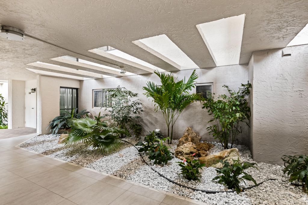 Photo of 5279 Fountains Drive S #305, Lake Worth, FL 33467 (MLS # R11131942)