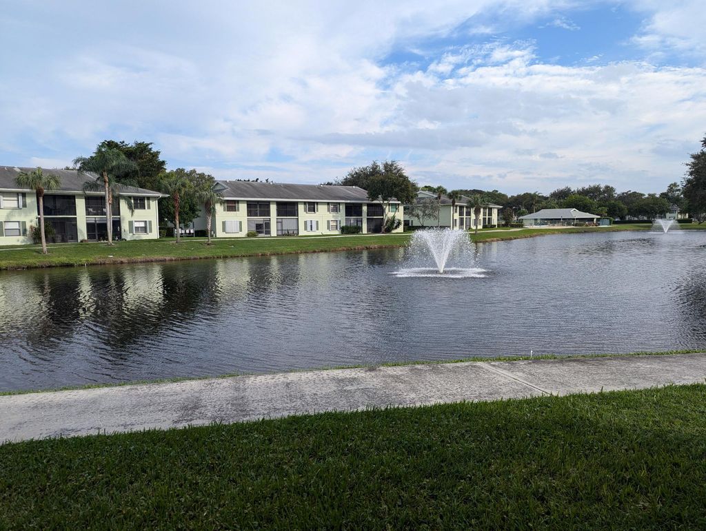 Photo of 801 Sabal Ridge Cir #C, Palm Beach Gardens, FL 33418 (MLS # R11029307)