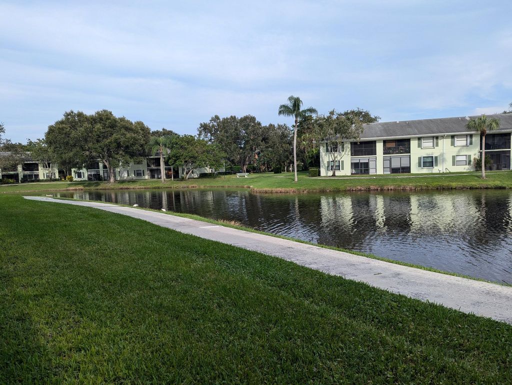 Photo of 801 Sabal Ridge Cir #C, Palm Beach Gardens, FL 33418 (MLS # R11029307)