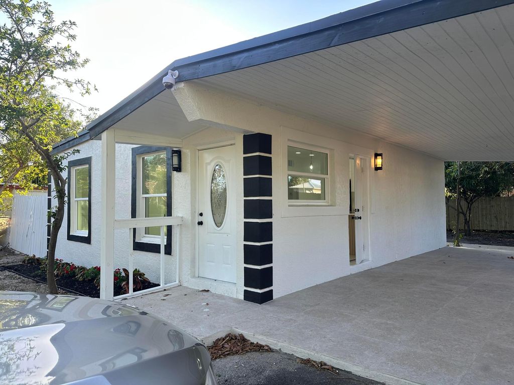 Photo of 4029 Plum Tree Drive, Lake Worth, FL 33462 (MLS # R11081293)