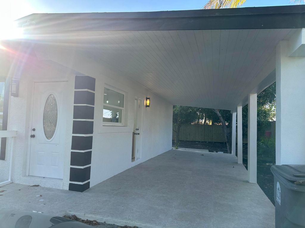 Photo of 4029 Plum Tree Drive, Lake Worth, FL 33462 (MLS # R11081293)