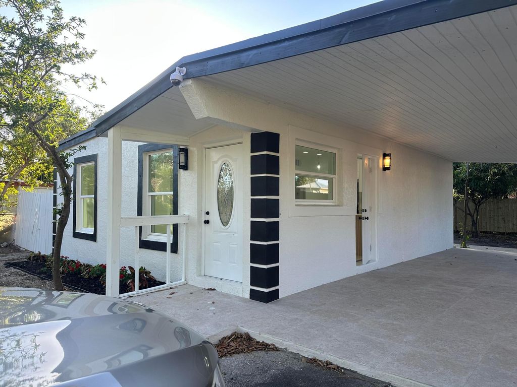 Photo of 4029 Plum Tree Drive, Lake Worth, FL 33462 (MLS # R11081293)