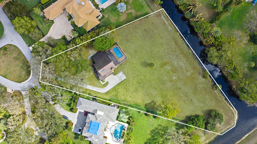 Photo of 8090 Native Dancer Road E, Palm Beach Gardens, FL 33418 (MLS # R11169938)
