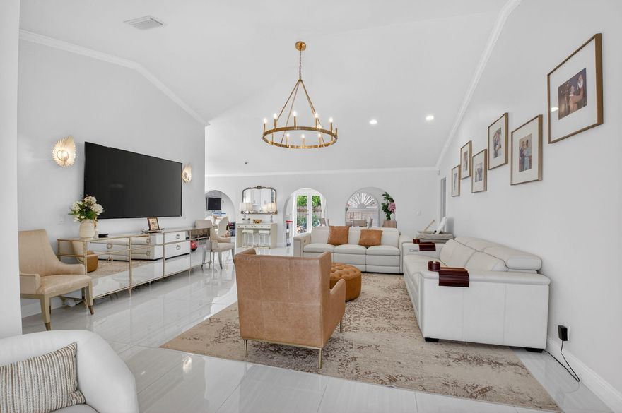 Welcome to Timbercreek, one of Boca Raton's most prestigious communities. This impeccably renovated residence offers refined living with expansive interiors, including a formal living room, an extended Florida room with a marble fireplace, and a sunlit eat-in kitchen designed for both everyday elegance and entertaining. Thoughtfully upgraded in 2024, the home features porcelain flooring, designer bathrooms, new appliances, and a dedicated laundry room with new washer and dryer. Additional enhancements include new interior doors, a hurricane-impact garage door, and new front and sliding doors (2026), along with accordion shutters throughout. Set on a spacious lot with room for a custom pool, just steps from a private park, top-rated schools, and minutes to dining, shopping, and beaches.