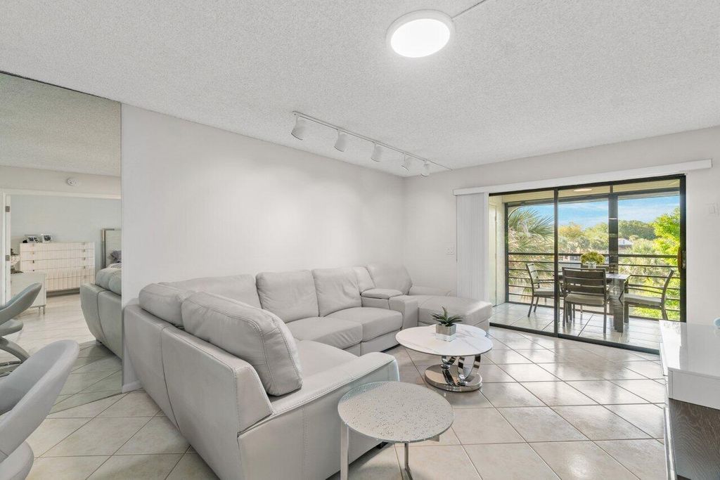 Photo of 10110 Cedar Point Boulevard #303, Boynton Beach, FL 33437 (MLS # R10968802)