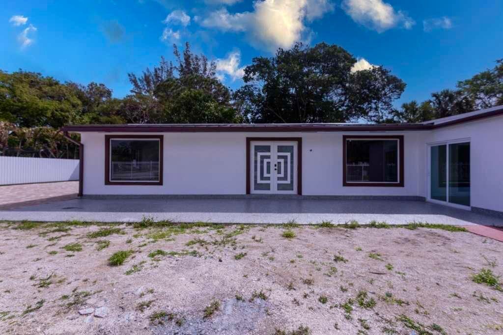 Photo of 696 Arlington Drive, West Palm Beach, FL 33415 (MLS # B26051344)