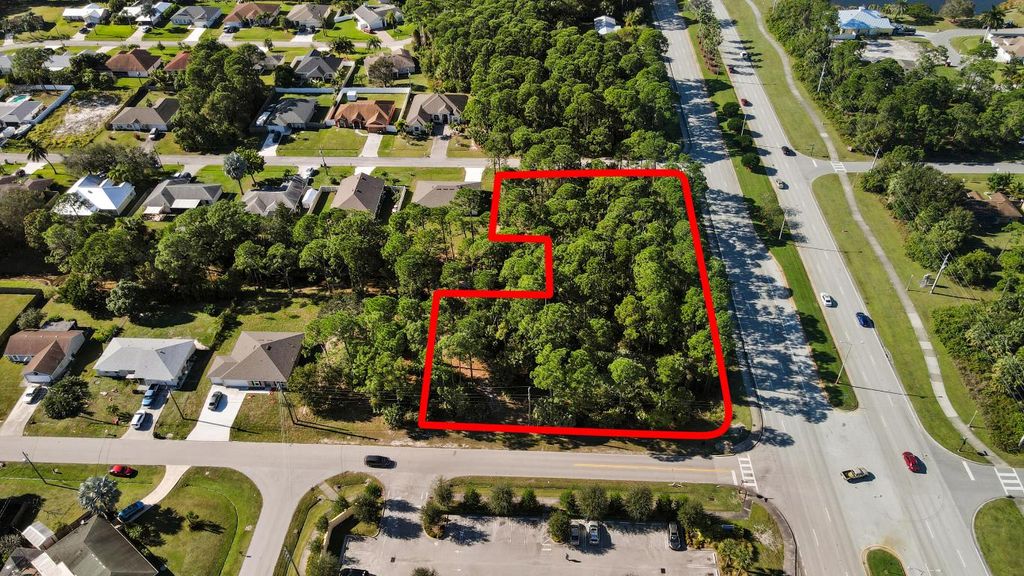 Photo of 1094 SW Gatlin Boulevard, Port Saint Lucie, FL 34953 (MLS # R10963208)