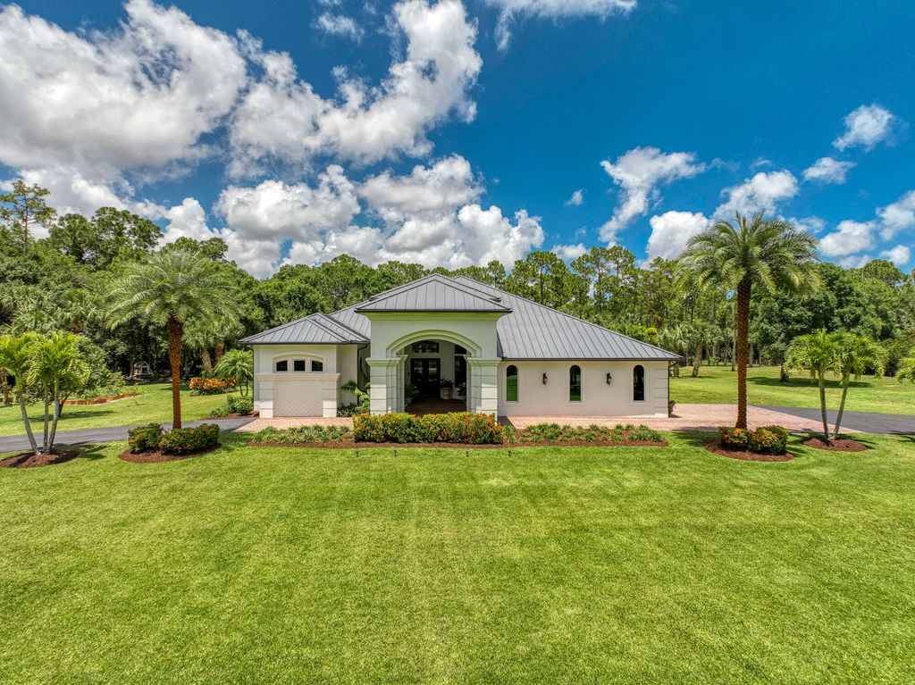 Photo of 9853 Whippoorwill Trail, Jupiter, FL 33478 (MLS # R10985548)