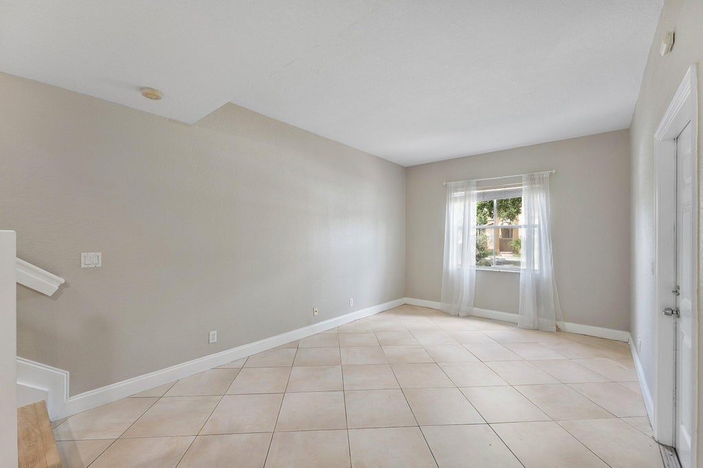 Photo of 2896 Hidden Hills Road #1002, West Palm Beach, FL 33411 (MLS # B26071211)