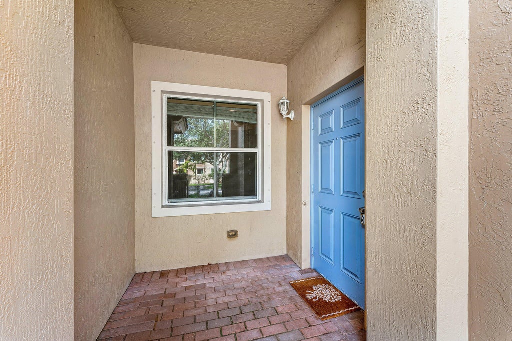 Photo of 2896 Hidden Hills Road #1002, West Palm Beach, FL 33411 (MLS # B26071211)