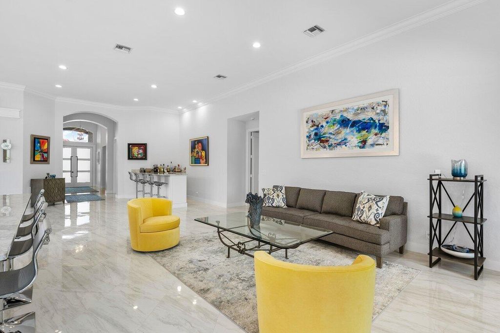 Photo of 135 Banyan Isle Drive, Palm Beach Gardens, FL 33418 (MLS # R10989012)