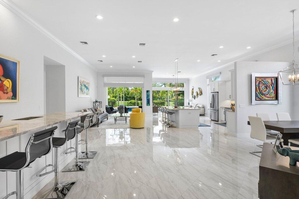 Photo of 135 Banyan Isle Drive, Palm Beach Gardens, FL 33418 (MLS # R10989012)