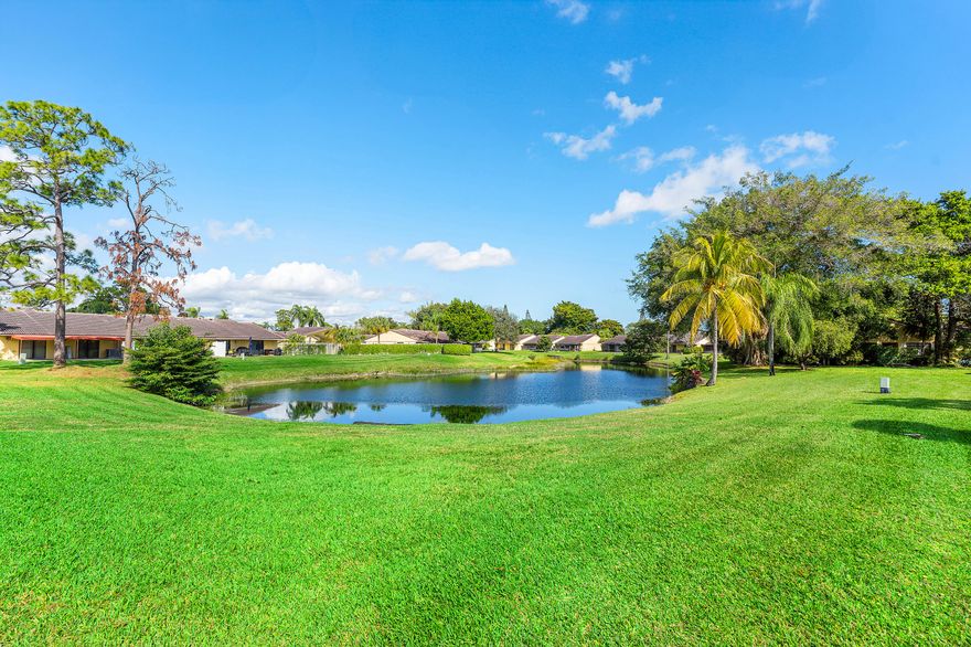 Wake up to tranquil lake views in this fully renovated, whisper-quiet villa designed for effortless South Florida living. Vaulted ceilings and impact windows create a bright, open feel throughout. Updates include a new roof, upgraded electrical panel, designer kitchen and baths, and new ceramic tile and luxury vinyl flooring--making this home truly move-in ready. Enjoy indoor-outdoor living from the screened porch to a private patio with retractable awning overlooking serene water views. Located in an A-rated school district for all three levels. Thornhill HOA offers low-maintenance living with cable, internet, exterior insurance, landscaping, and pool included. Walk to the YMCA, Publix, new Aldi, and houses of worship. Furniture negotiable; low-down-payment financing allowed.
