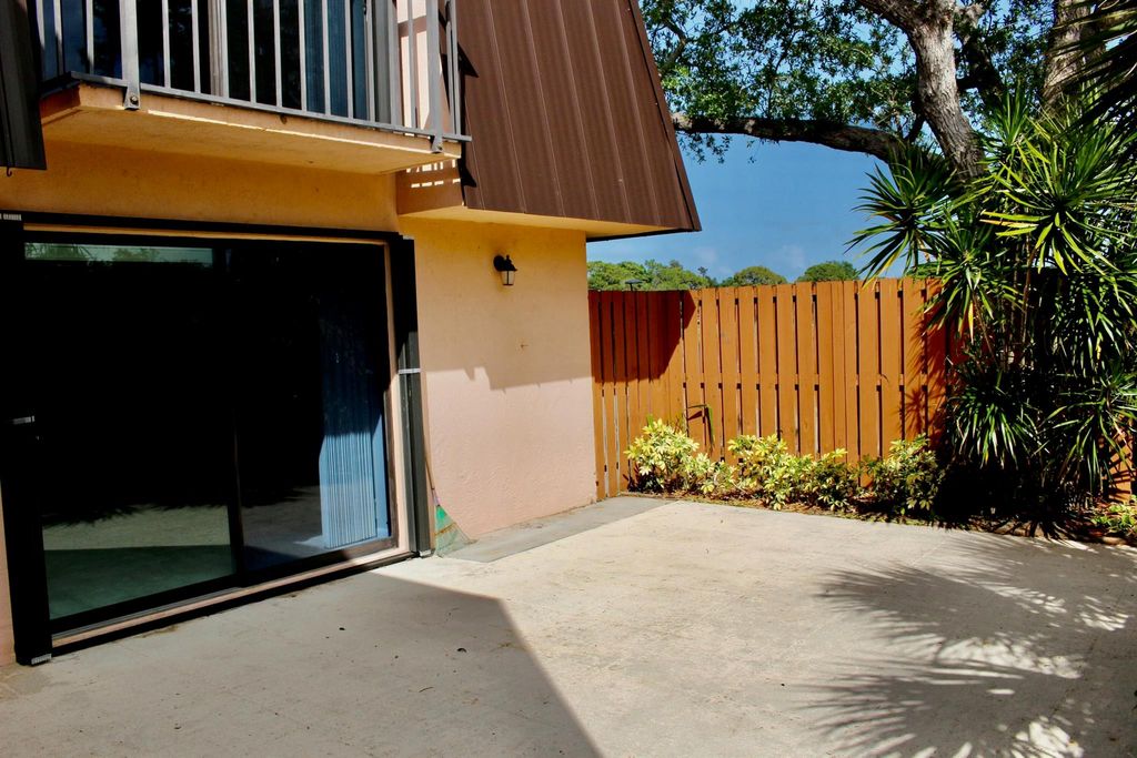 Photo of 5820 SE Windsong Lane, Stuart, FL 34997 (MLS # R11079348)