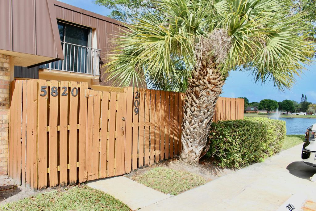 Photo of 5820 SE Windsong Lane, Stuart, FL 34997 (MLS # R11079348)