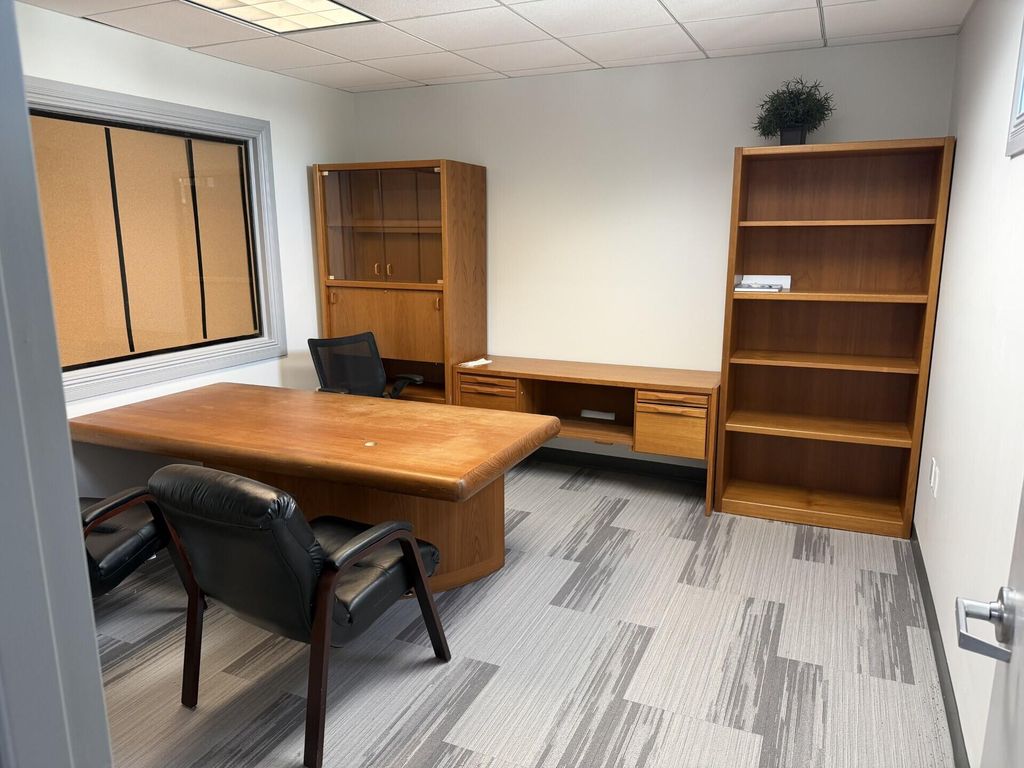 Photo of 833 Shotgun Road #H, Sunrise, FL 33326 (MLS # B26007196)