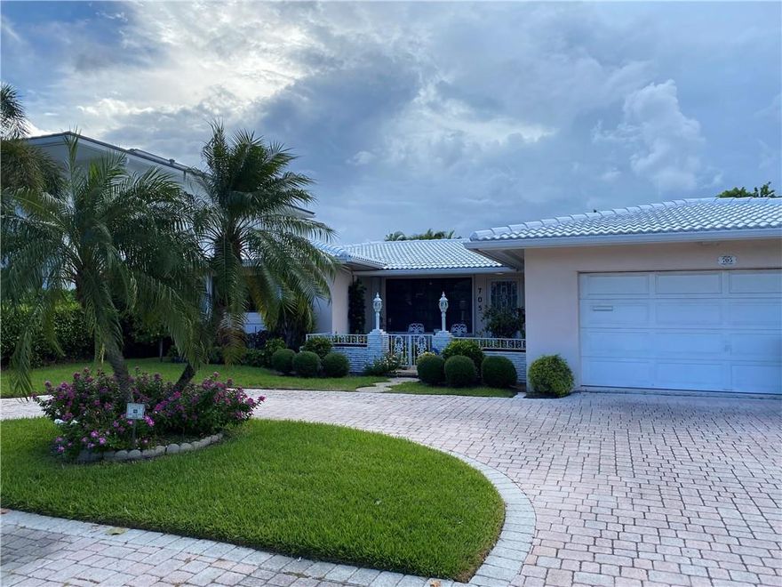 Calling all investors!! Fantastic opportunity to renovate or build your dream home in the sought after & gated Riviera Isles Community off Las Olas! This single-story cottage home has a 3 bedroom/3 bath split floor plan with 2 car garage & pool. The entire house has polished Terrazzo floors under carpeting and vinyl flooring. 70' of water frontage with 5' setbacks to accommodate up to a 60' boat. Newer seawall cap. Located just minutes to the Intracoastal and ocean. Walking distance to the beach, exquisite dining, shops and art galleries. A must see!