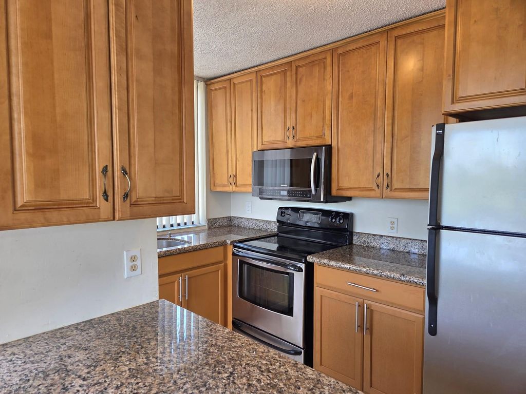 Photo of 4200 Inverrary Boulevard #3103, Lauderhill, FL 33319 (MLS # F10520273)